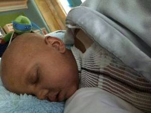 ashton was diagnosed in a particularly horrific fashion.  he and his mother were going to his sisters confirmation.  ashton and erin were going to stay overnight with me but ended up in the hospital because ashton had an ear infection.  the doctors figured out he had cancer. i'm sure i would have broken down a dozen times if i were erin but she has become the strongest woman i know.